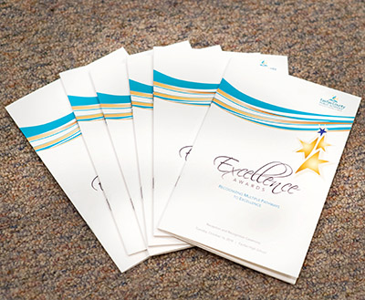 programs from the excellence awards ceremony